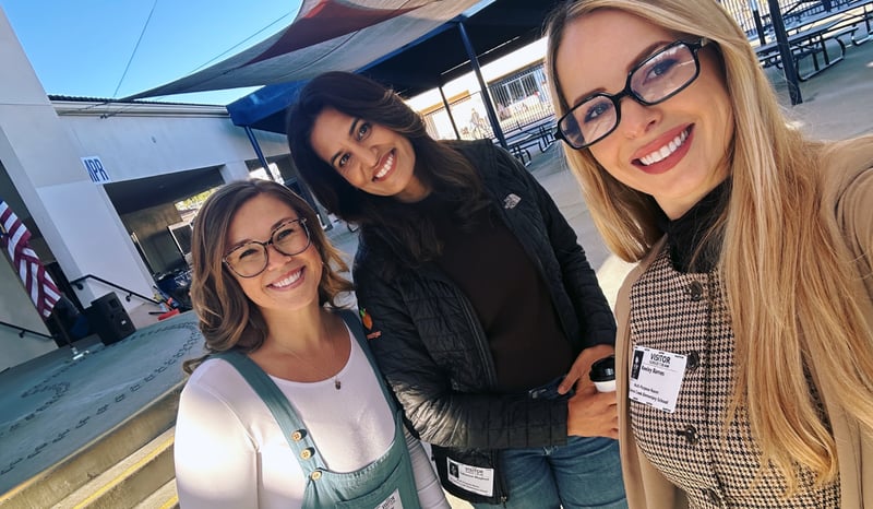 Award presenters smiling for the camera
