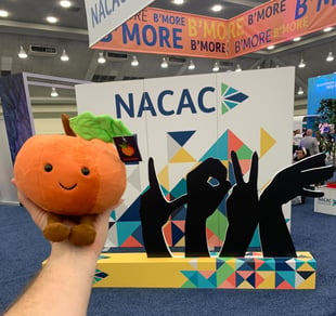 NACAC sign with Peachy