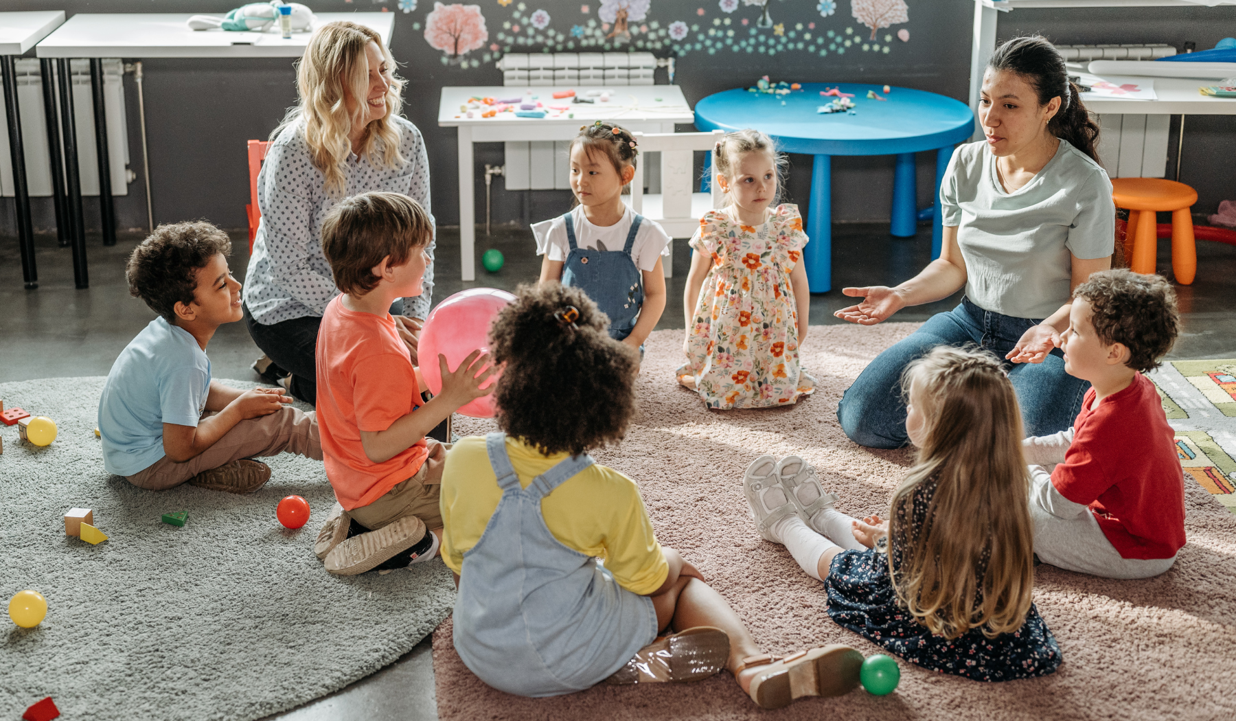 Kids learning in class with teachers